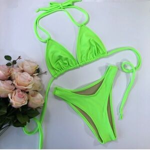 Women’s neon, green strapping bikini
